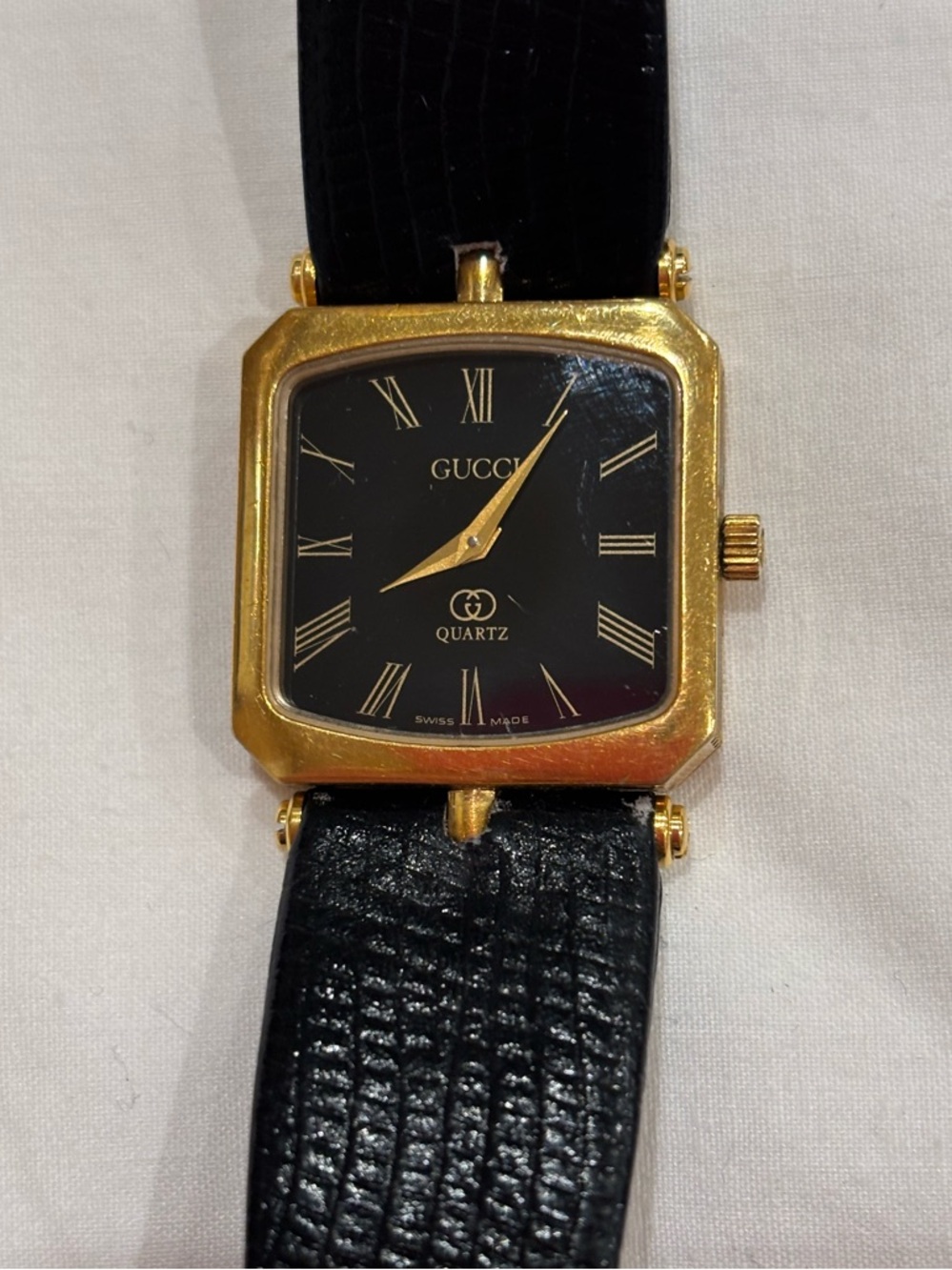 Gucci Black and Gold Square Quartz Watch
